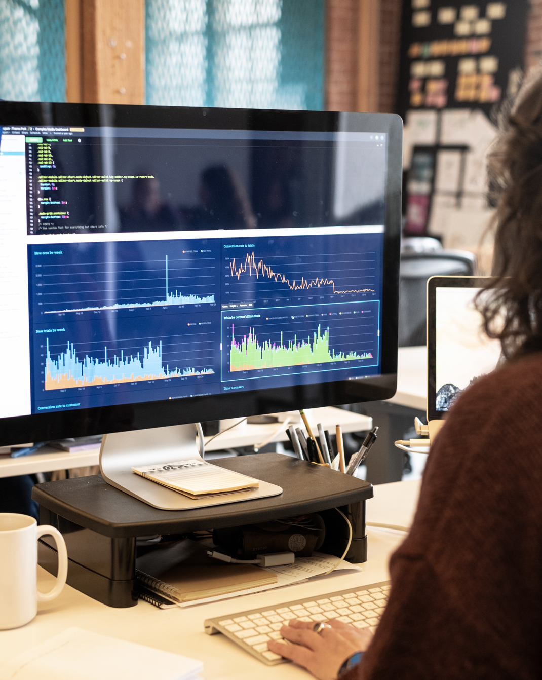 Person working with charts and analytic tools